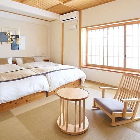 Yufuin Rakuyu Hotel Bagian luar foto